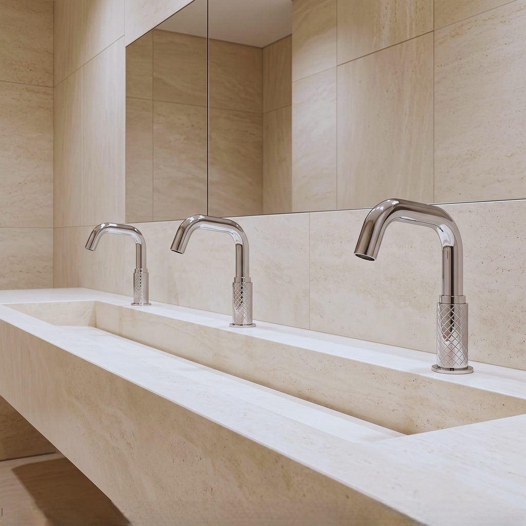 Kohler Kinesis touchless faucet in an architectural theme park or resort restroom